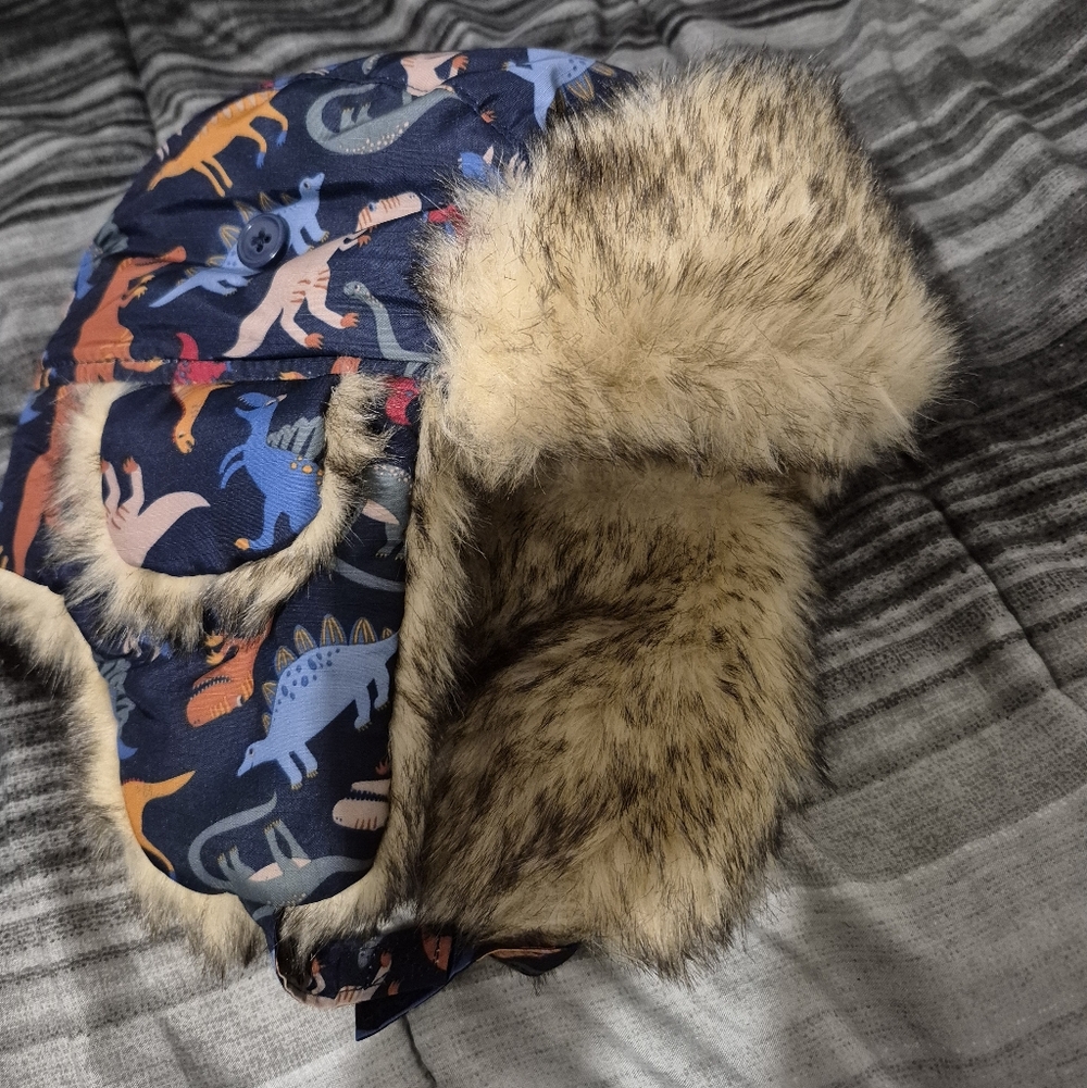 The Children's Place Faux Fur Hat with Dinosaurs And Blue and Brown Accents